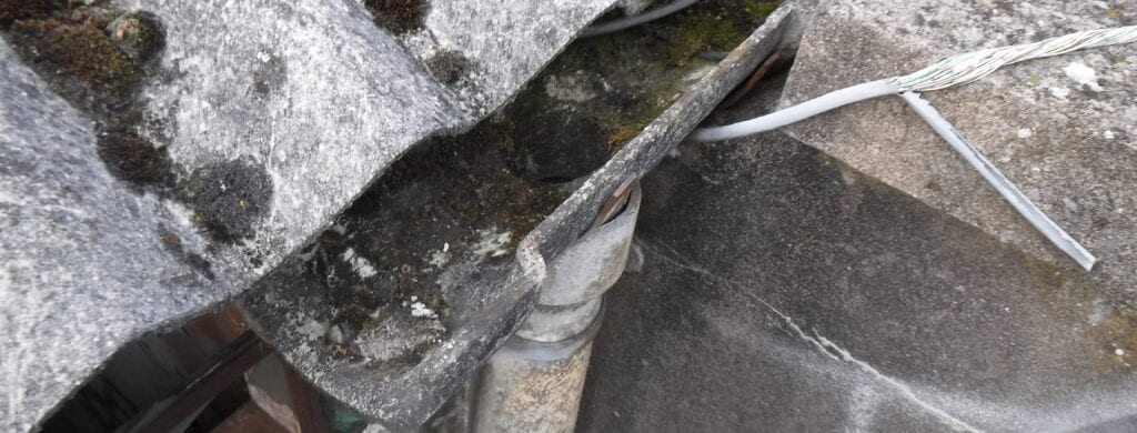 Asbestos cement roof and guttering